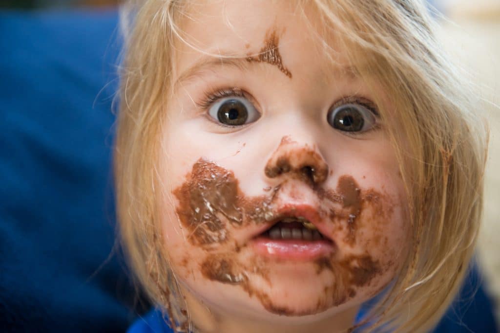 Girl is eating chocolate meal