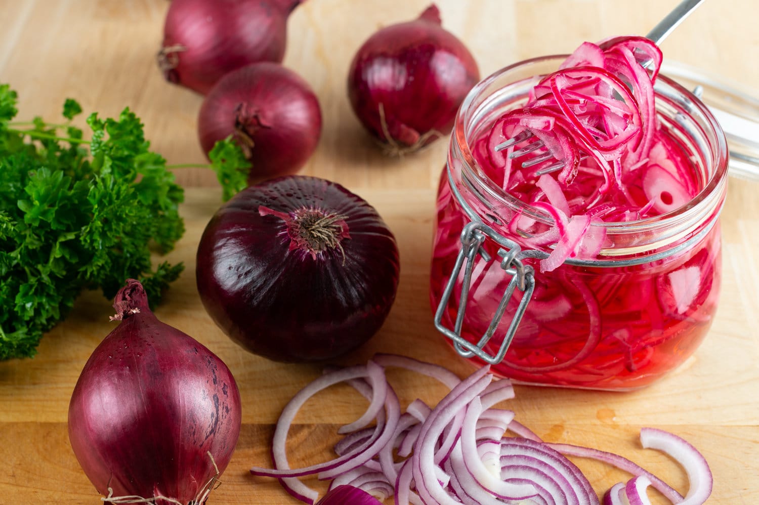 Homemade pickled sliced red onion.