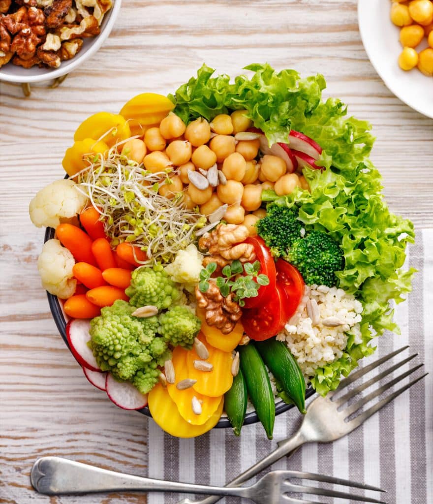 Buddha bowl, healthy and balanced vegan meal, fresh salad with a variety of vegetables, healthy eating