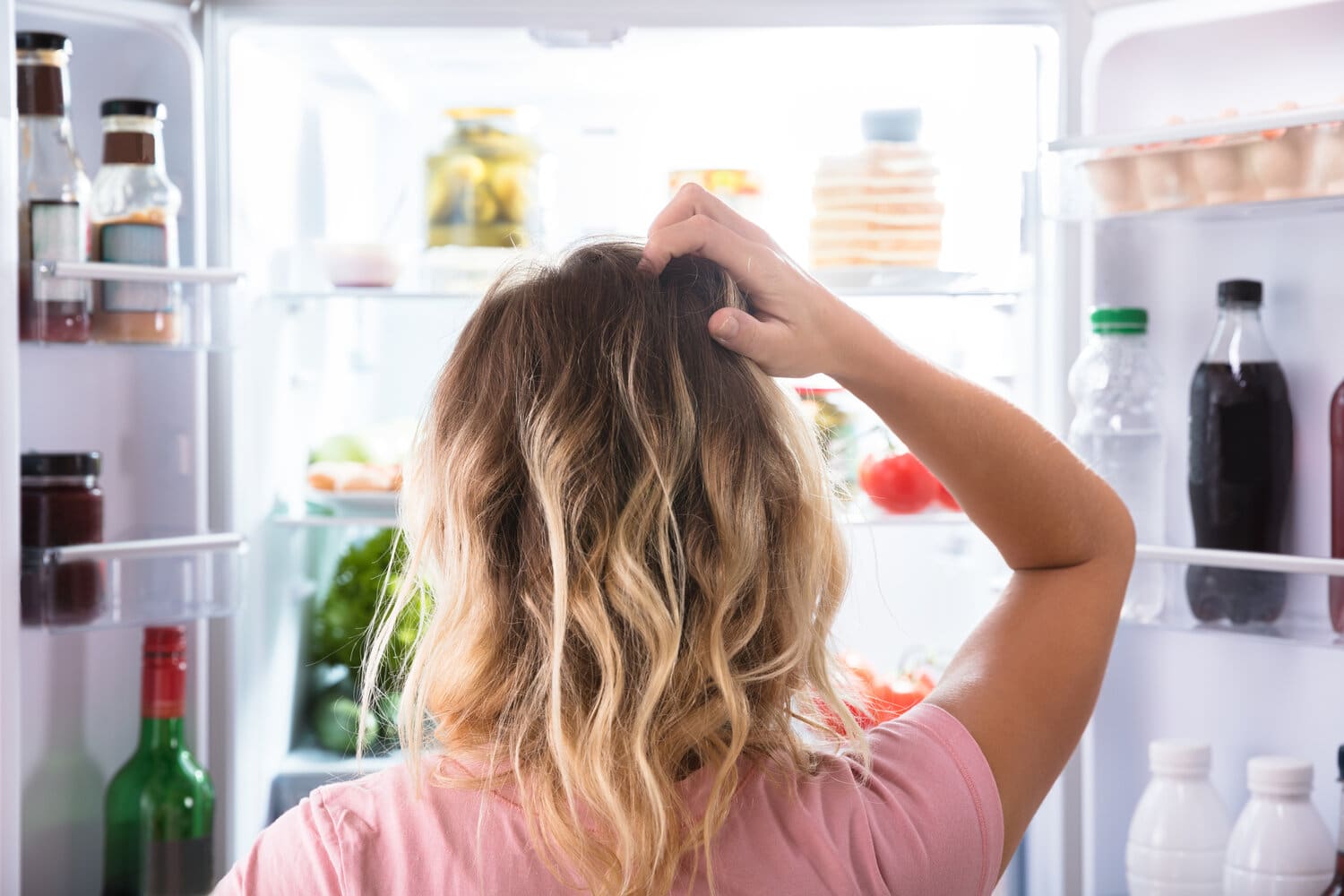 Woman doing poor eating choices