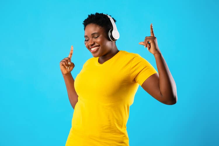 Woman listening music while doing physical activity