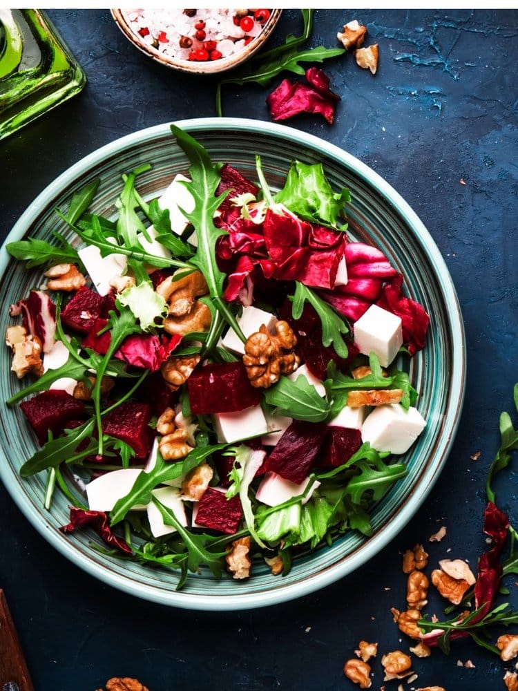Arugula beet and cheese salad with fresh radicchio and walnuts as weight loss diet